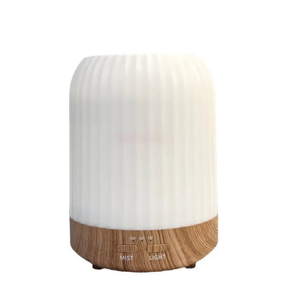 Home Essential Oil Aromatherapy Machine Automatic Spraying Bedroom Diffuser with Small Night Light Humidifier